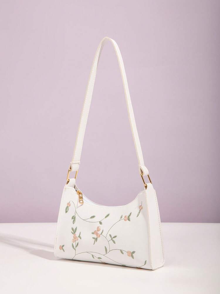Bolso cruzado blanco con bordado floral – ideal para vacaciones
