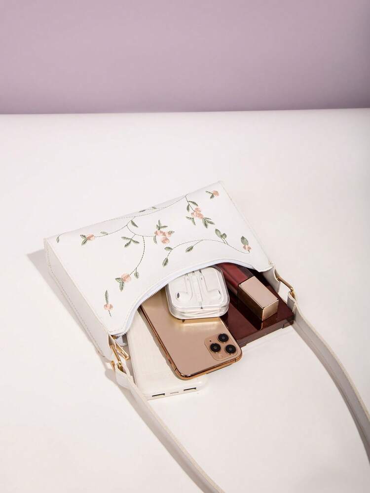 Bolso cruzado blanco con bordado floral – ideal para vacaciones