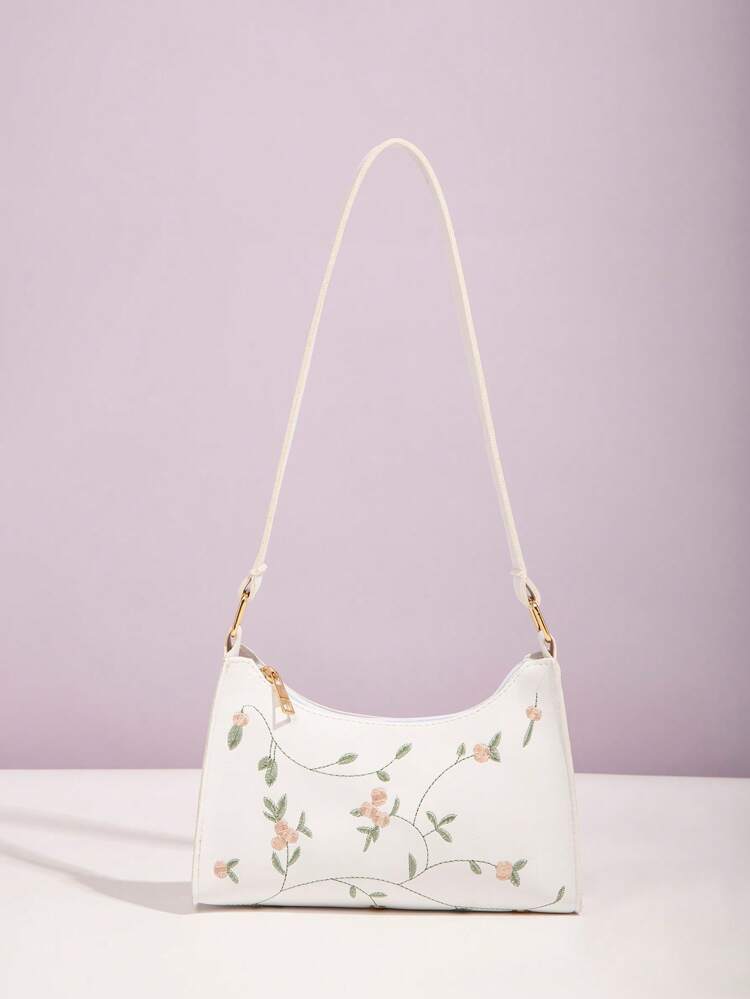 Bolso cruzado blanco con bordado floral – ideal para vacaciones