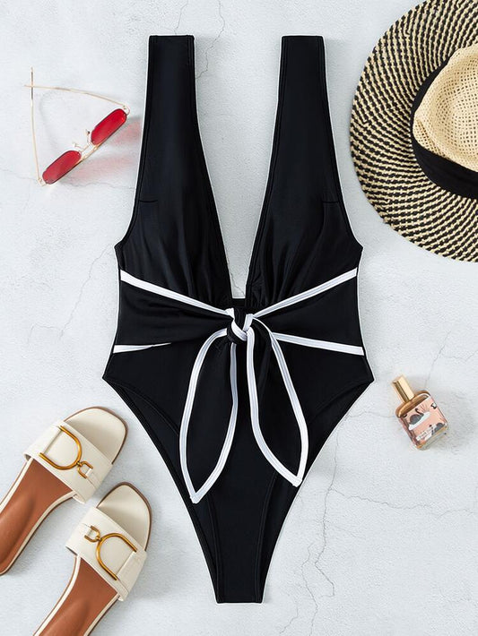 Bañador de una pieza con escote profundo y nudo delantero – estilo SHEIN Swim.