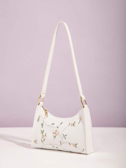 Bolso cruzado blanco con bordado floral – ideal para vacaciones